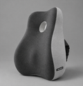 OrthoCore charcoal grey contoured memory foam lumbar support pillow on a plain studio background