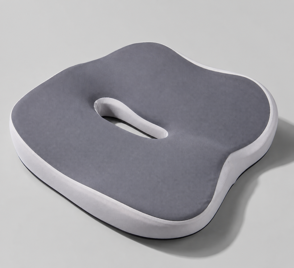 OrthoCore grey contoured memory foam seat cushion on a plain studio background