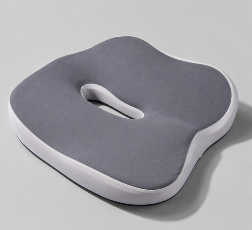OrthoCore grey contoured memory foam seat cushion on a plain studio background